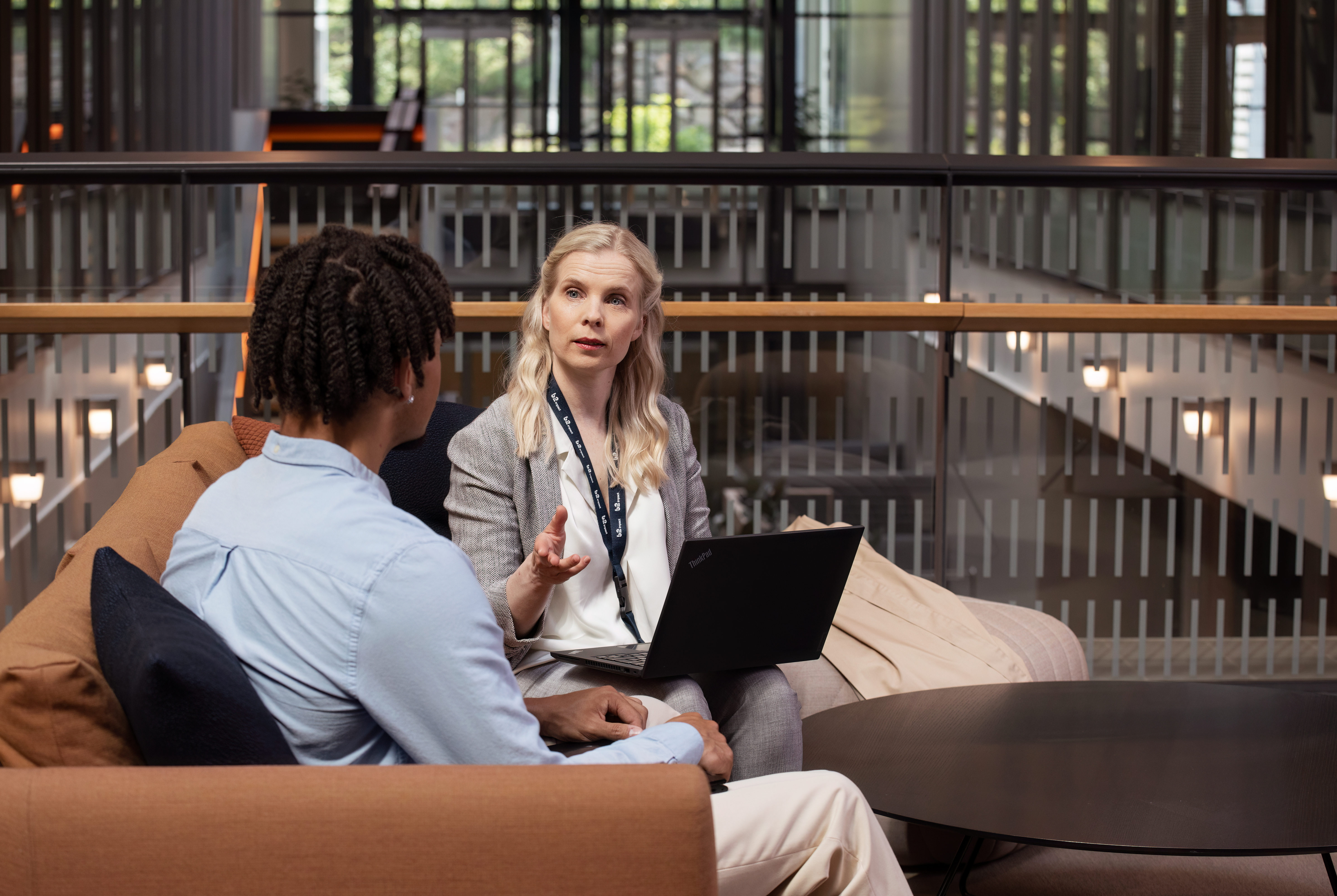 Man and woman sitting in a office space